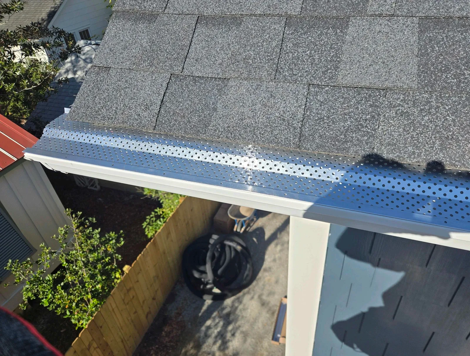 Newly installed seamless gutters on a Charleston home