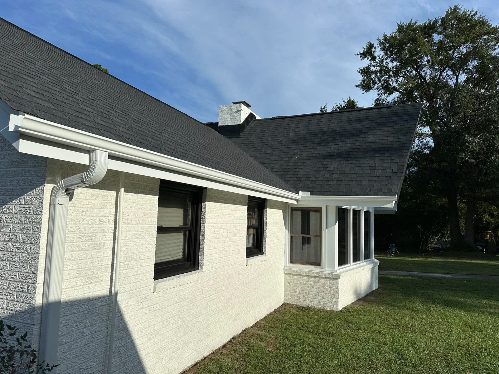 Seamless gutter installation in Charleston SC — American Custom Exteriors